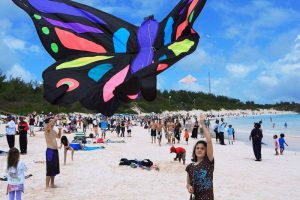 Katie Boyle launches her butterfly kite Good Friday at Horseshoe Beach.